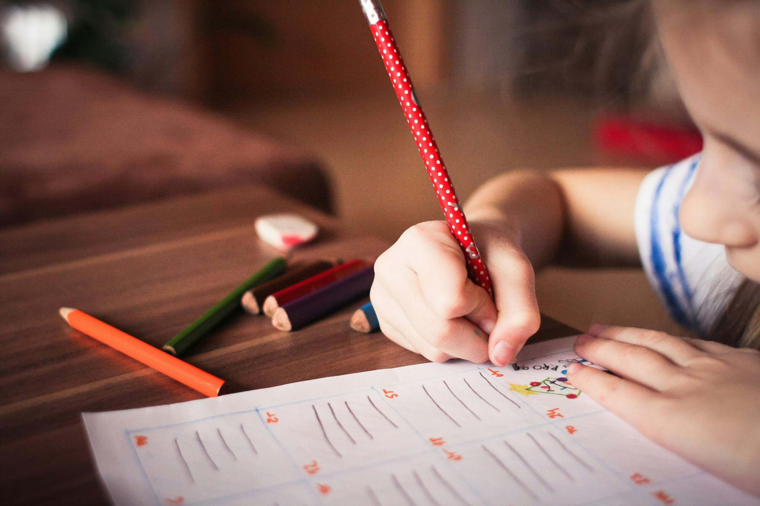 student-writing-on-paper