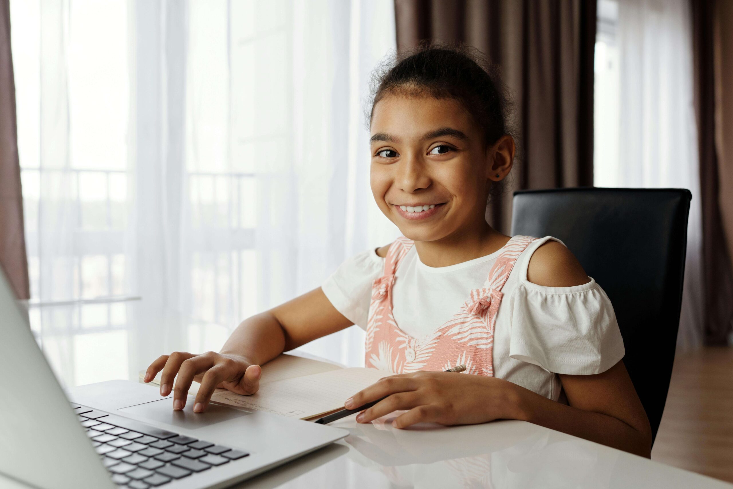 student tutoring on a laptop